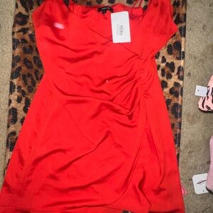 Sexy red dress with touched sides, boutique brand new with tags.